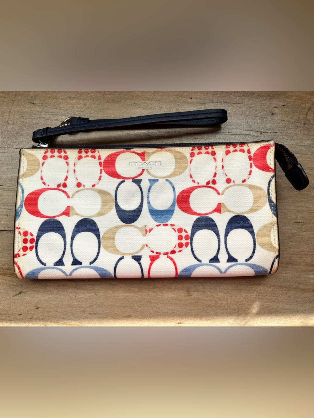 Coach Multicolor Signature C Zip Wristlet in Navy, Red, Tan, Cream. - Picture 1 of 9